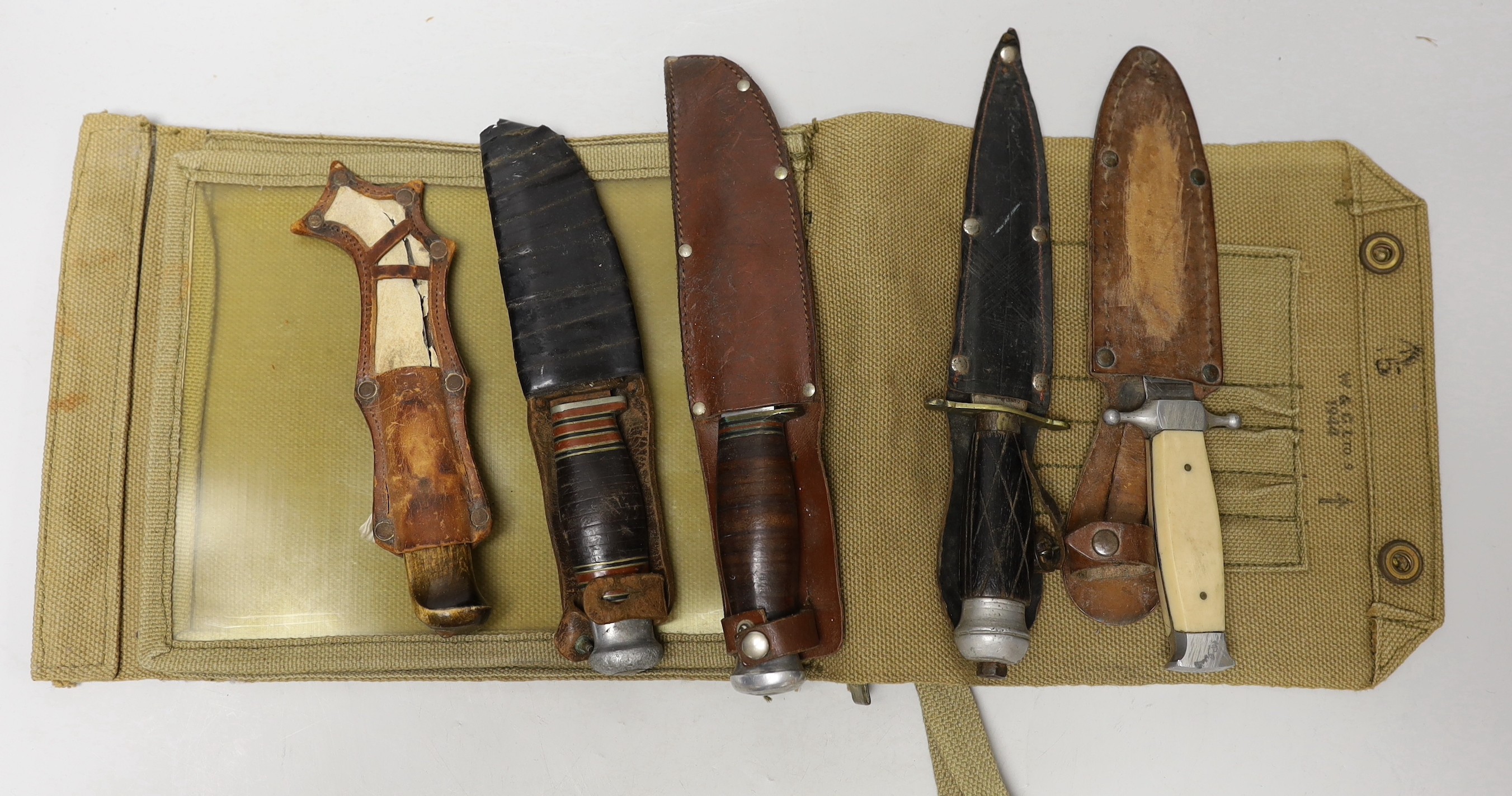 A group of five various knives